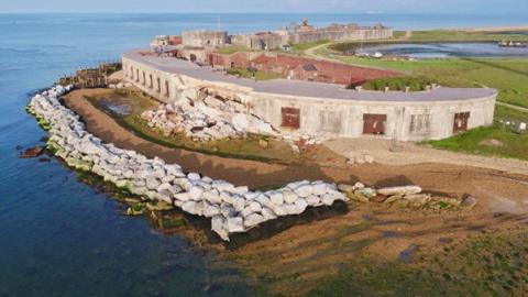 Hurst Castle showing collapsed portion of east wing (copyright English Heritage).